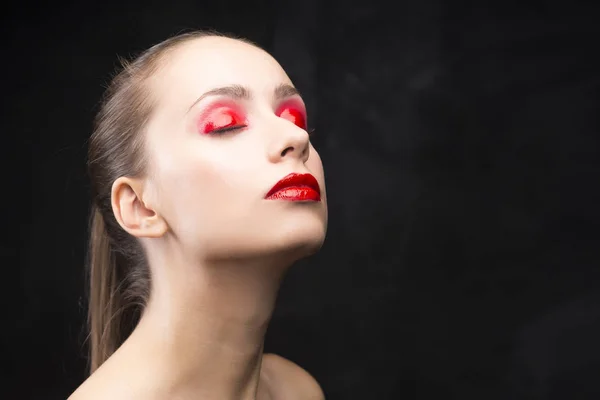 Girl with the red eyeshadow covered with gloss — Stock Photo, Image