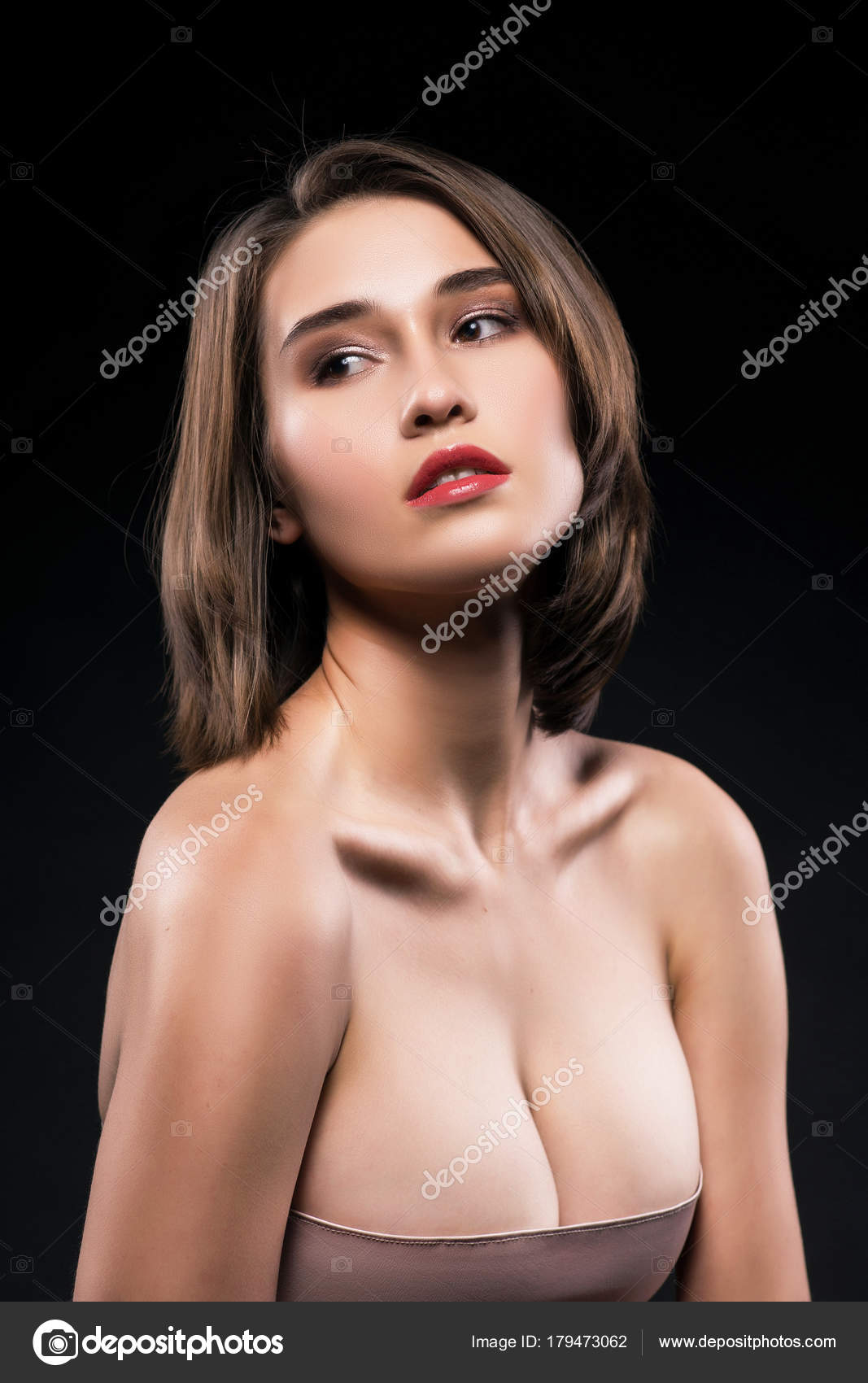 Beautiful big breasted mixed asian-caucasian race girl. Stock