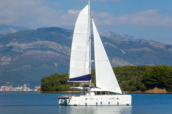 Sailing catamaran in Tivat bay