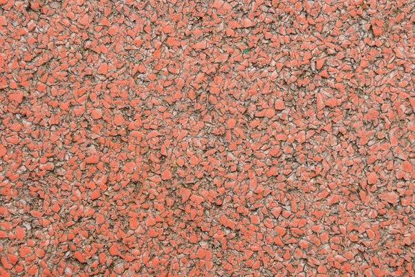 Naadloze textuur van een coating van kruimels van bright rode decoratieve stenen — Stockfoto