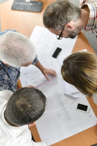 Architecten in een teamvergadering — Stockfoto