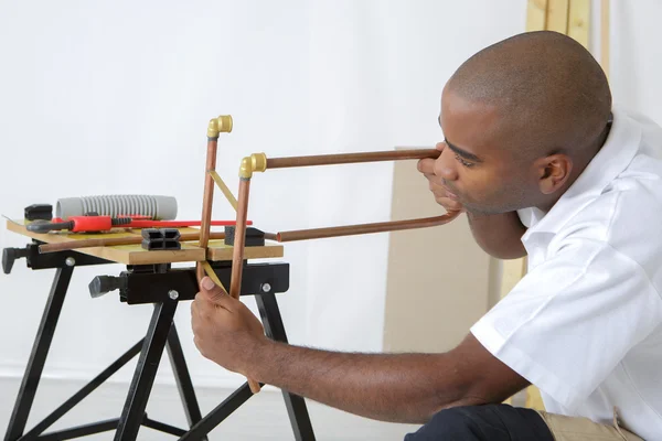 Handyman at work and handyman — Stock Photo, Image