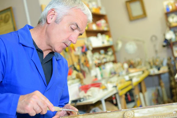 Craftsman at work and man — Stock Photo, Image