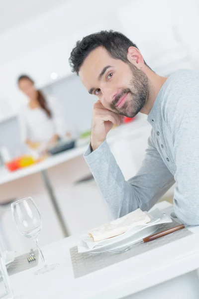Young man waiting for his dish — Stock Photo, Image