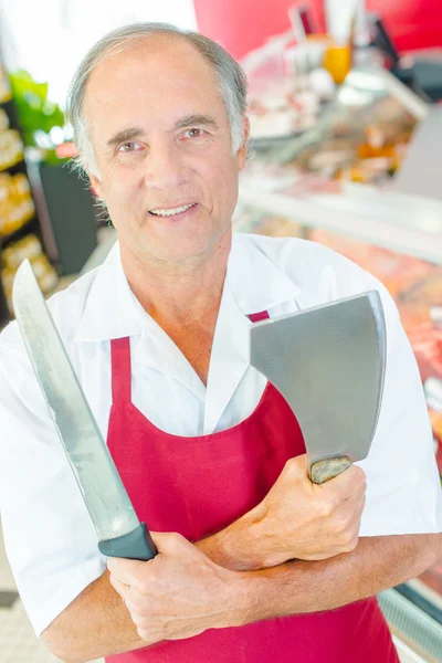 Butcher holding knife — Stock Photo, Image