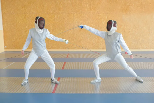 Two people in fencing joust — Stock Photo, Image