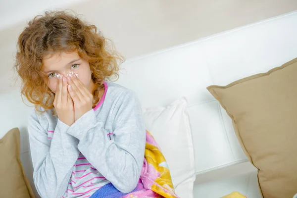 Girl holding her nose — Stock Photo, Image