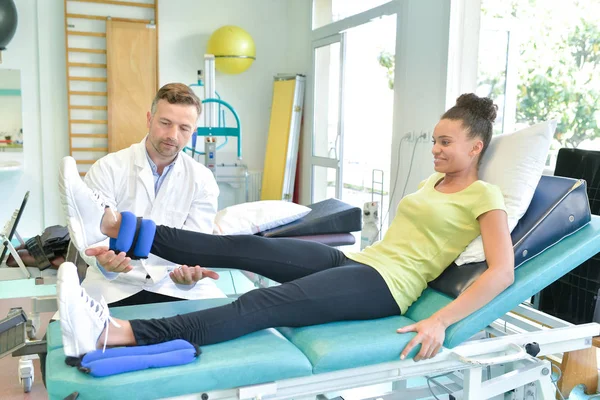 Pretty female at the physiotherapist — Stock Photo, Image