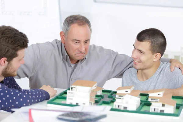 Teachers and student in architecture — Stock Photo, Image