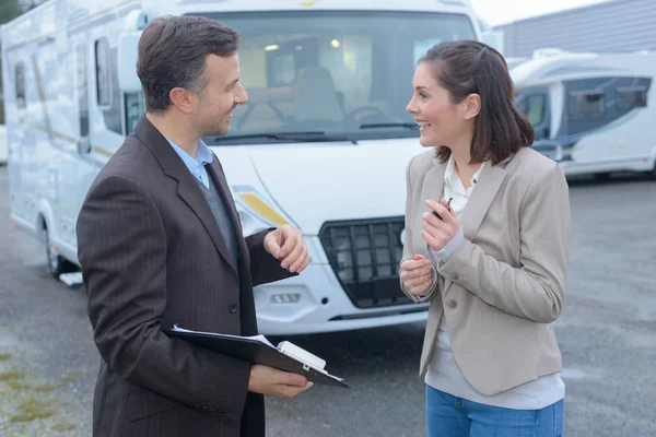 Female driver holding happy to get driving results — Stock Photo, Image