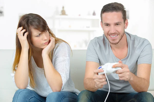 Anoyed female because of her gamer boyfriend — Stock Photo, Image