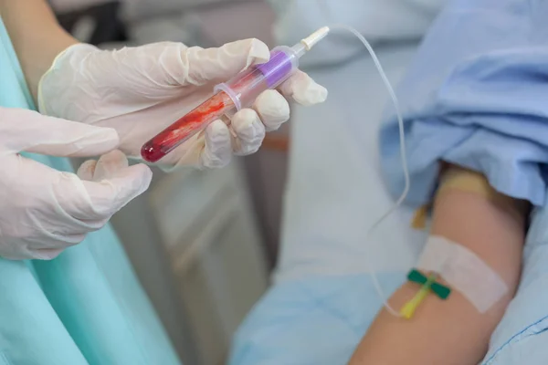 Taking blood sample and blood — Stock Photo, Image