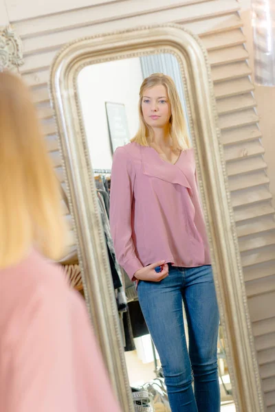 Girl fitting a blouse — Stock Photo, Image