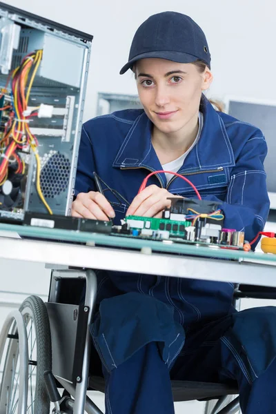 Portrait of disabled computer technician