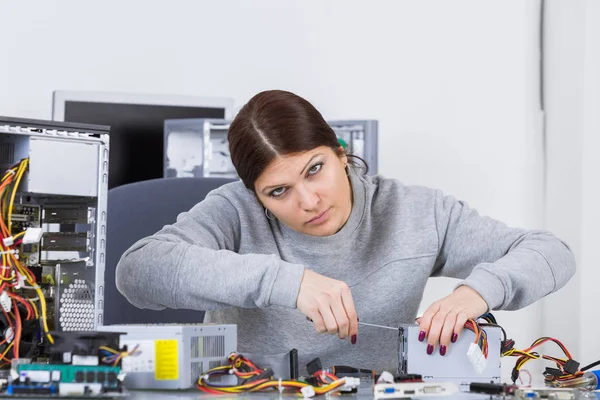 Electronic equipment assembler and work — Stock Photo, Image