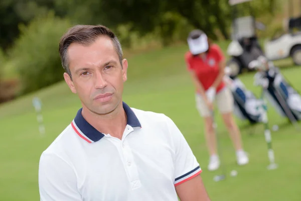 De golf tränare och golf — Stockfoto