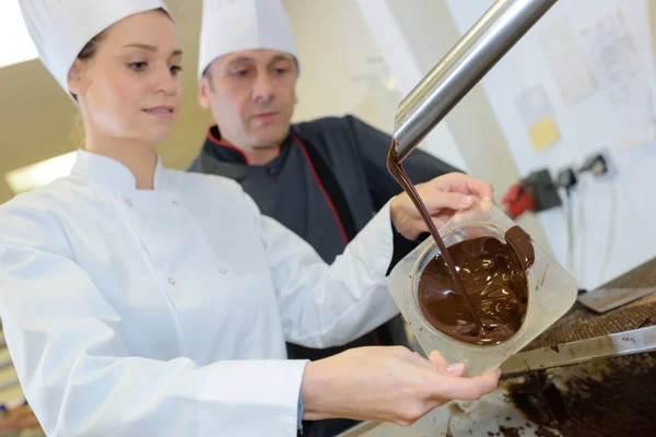 Melting chocolate and sweet — Stock Photo, Image