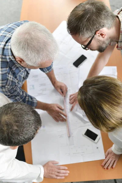 Architects in a group meeting — Stock Photo, Image