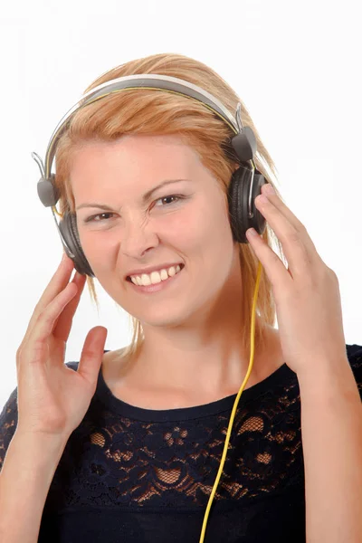 Luisteren naar muziek en volwassene — Stockfoto