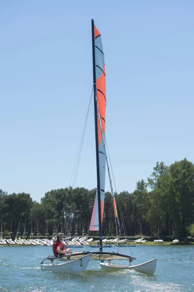 Sailing on a lake - summer and sports theme — Stock Photo, Image