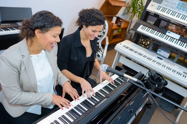 Testing the keyboards and boutique — Stock Photo, Image