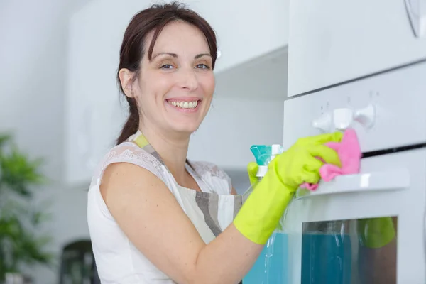 Female cleaning and woman — Stock Photo, Image