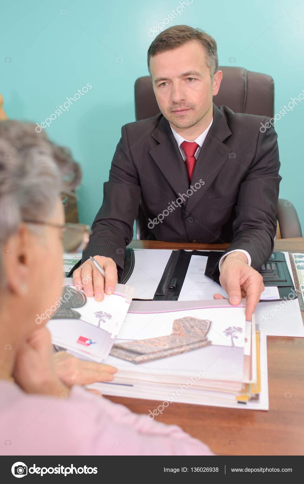 Funeral director with mourning widow — Stock Photo © photography33
