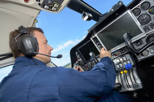 Pilot operating dashboard controls — Stock Photo, Image