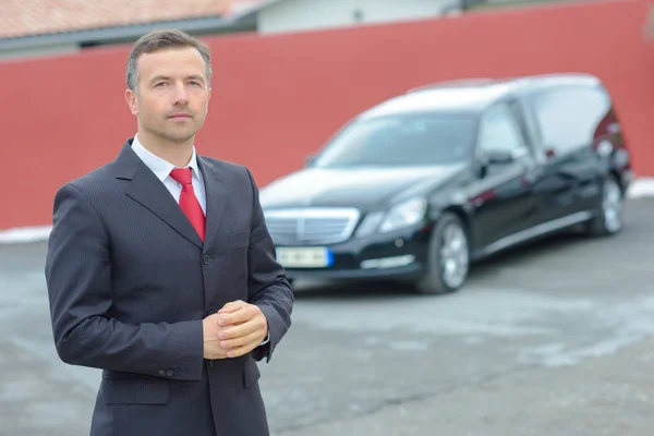 Chauffeur and young  handsome — Stock Photo, Image