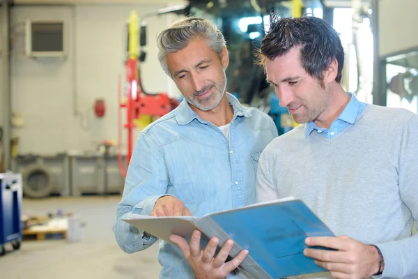 Investor reading the folder — Stock Photo, Image