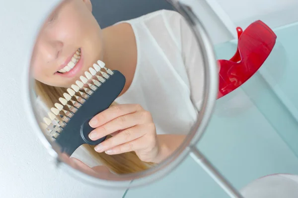 Woman with teeth rack — Stock Photo, Image