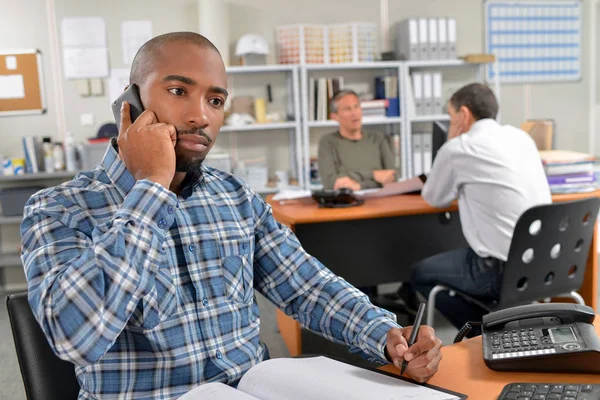 Man on the phone in office — Stock Photo, Image