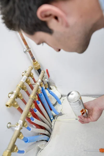 Plumber making a few adjustments — Stock Photo, Image