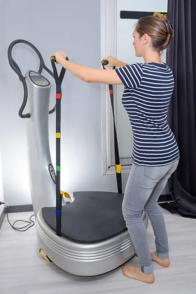 Working out on a machine — Stock Photo, Image