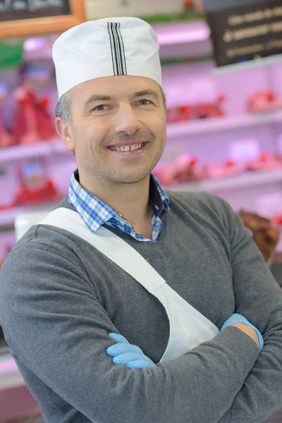 Confident butcher posing and work — Stock Photo, Image
