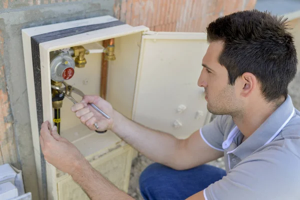 Plumber outside and young — Stock Image Plumber outside and young Royalty Free Stock Photos