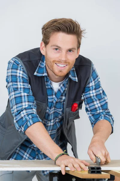 Portrait of young carpenter at work — Stock Photo, Image