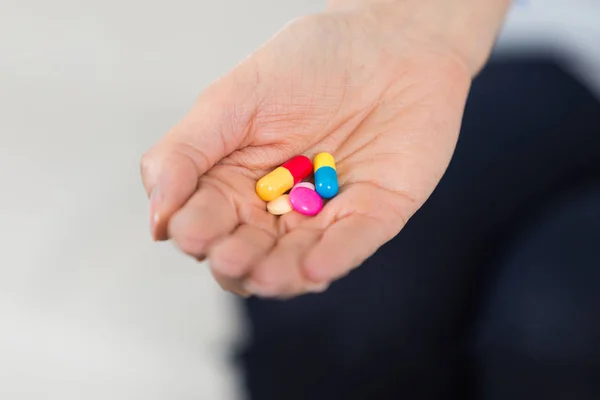 Handfull of medicine help with cure — Stock Photo, Image