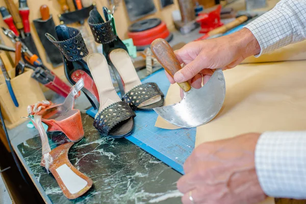 Shoemaker at work and cobbler — Stock Photo, Image