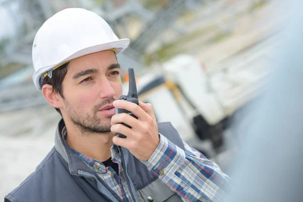 Worker on the walkie-talkie — Stock Photo, Image