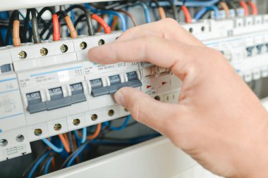 Checking a fusebox and activity clipart