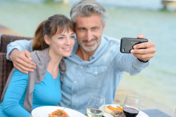 Vastleggen van het moment en foto — Stockfoto