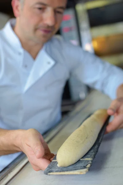 Ремісник сирий багет і робота — стокове фото