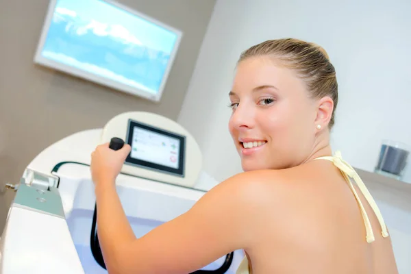 Young woman doing physical exercises — Stock Photo, Image