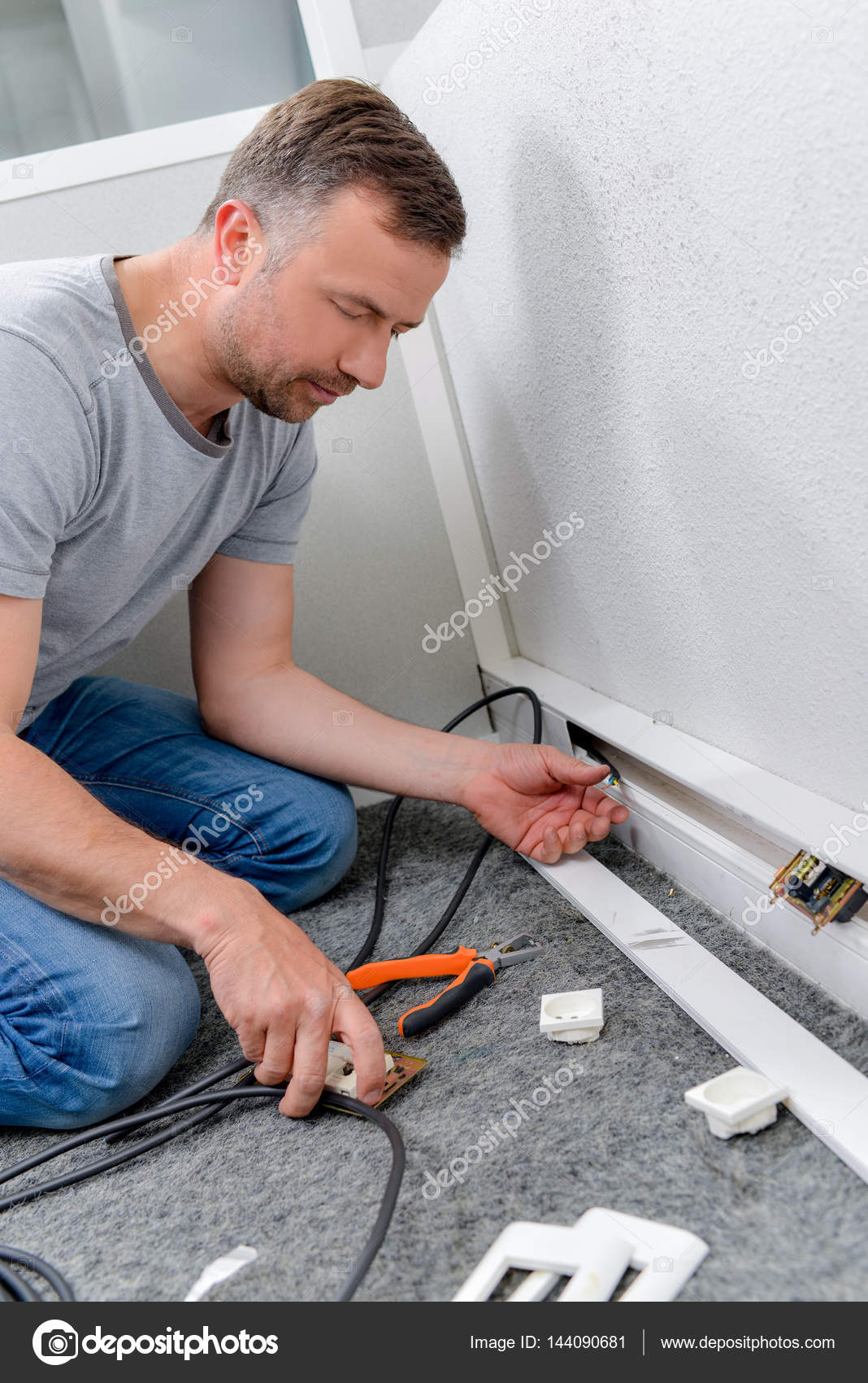 Fixing a broken electrical socket Stock Photo by ©photography33 144090681