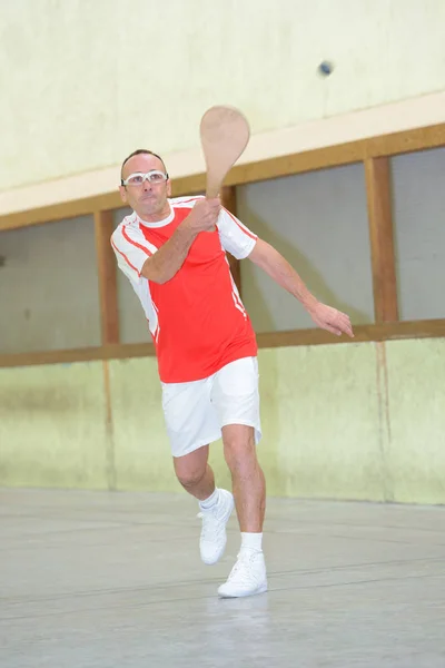 Man spelen pala en sport — Stockfoto