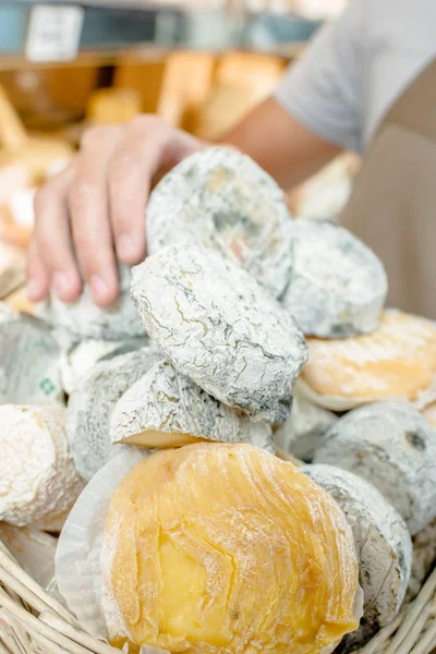 Holding cheese and aged — Stock Photo, Image