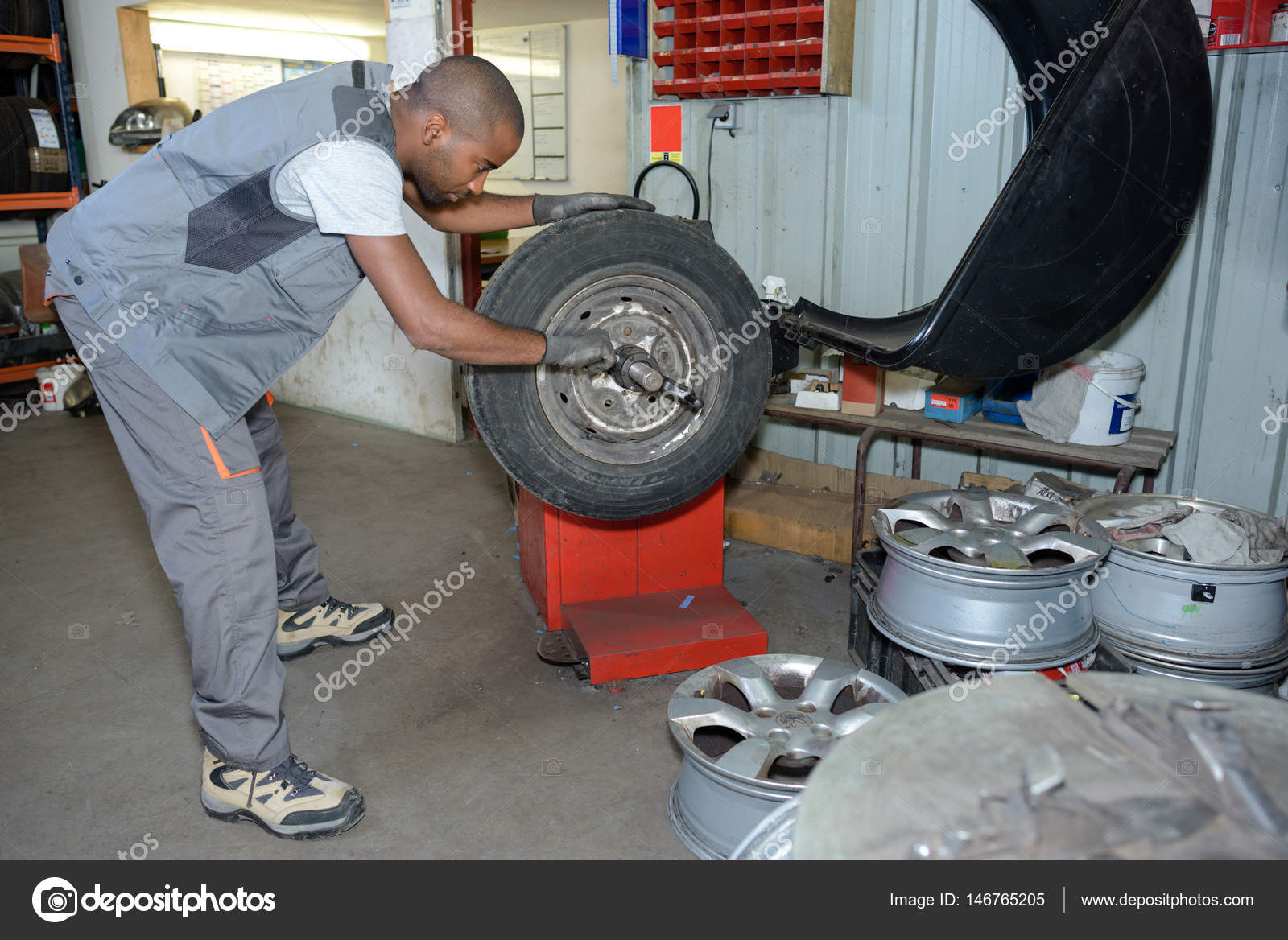 Inspecting the wheels and tire Stock Photo by ©photography33 146765205