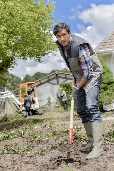 Cavar ese suelo y el hombre — Foto de Stock