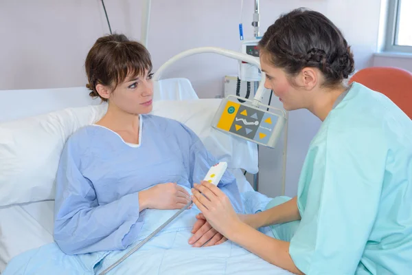 Listening to the nurse — Stock Photo, Image